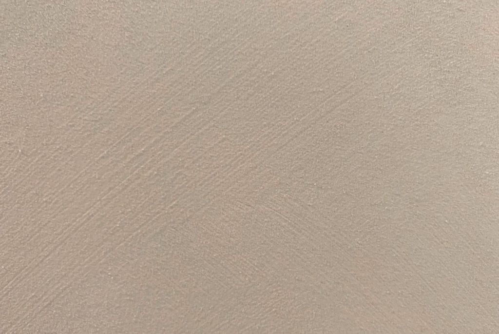 Nahaufnahme einer frisch verputzten Wand