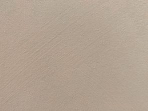 Nahaufnahme einer frisch verputzten Wand